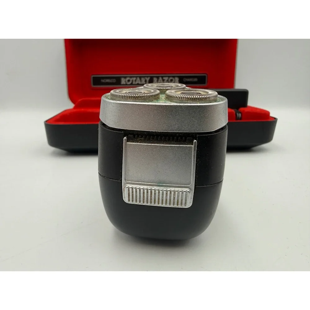 Vintage Norelco Rotary Razor Tripleheader Shaver with Red Lined Case and Charger